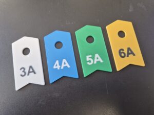 Étiquettes de Cotation Personnalisées pour Salles d’Escalade