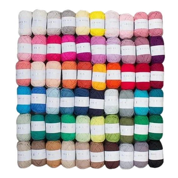 Nuancier complet des pelotes de coton Creative Ricorumi DK de Rico Design, montrant un large assortiment de couleurs vives et pastel pour le crochet.